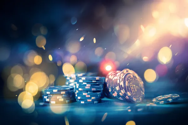 A glamorous woman holding casino chips in a neon-lit environment, representing the premium online casino atmosphere of GB44.